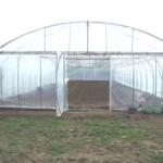 La porte de service du pignon relevable de nos serres