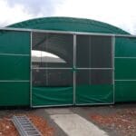 Abri agricole bâché avec double porte coulissante vue de face