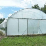 Une grande serre professionnelle, pignon relevable et ALE